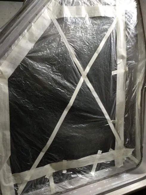 View of the front door opening with stretched film