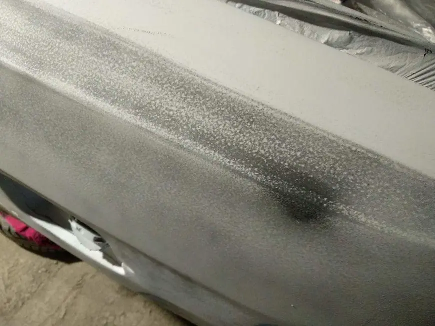 View of the rear left fender before sanding