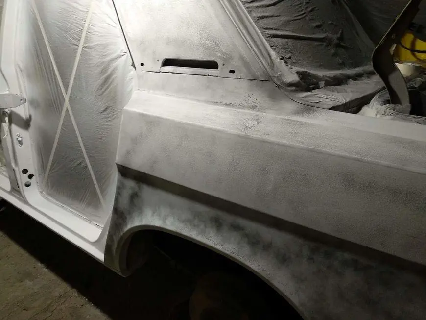 View of the rear left fender and post during sanding