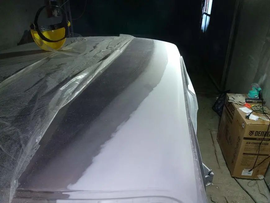 Distant view of the roughly sanded surface of the transition boundary on the roof