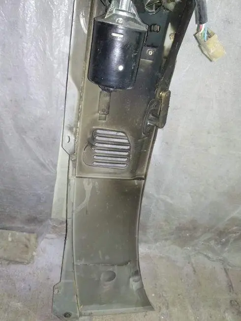 Damaged wiper panel - inside view from below