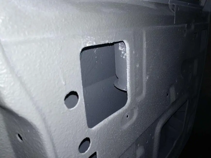 View through the technological opening on the internal cavities of the door