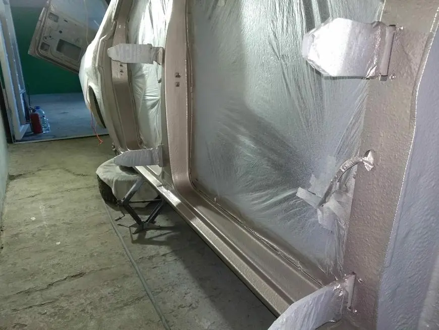 Body after coating it with anticorrosive and painting