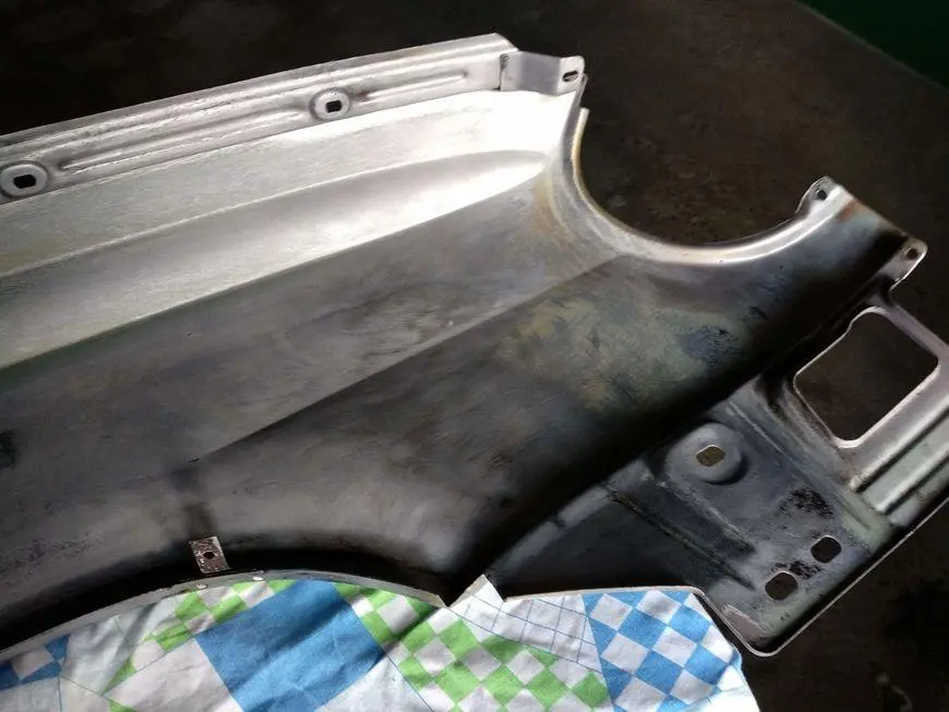 The inner front part of the wing after cleaning and treatment with a rust converter