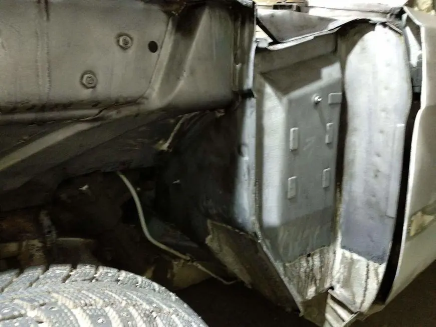 The rear of the mudguard treated with a rust converter once