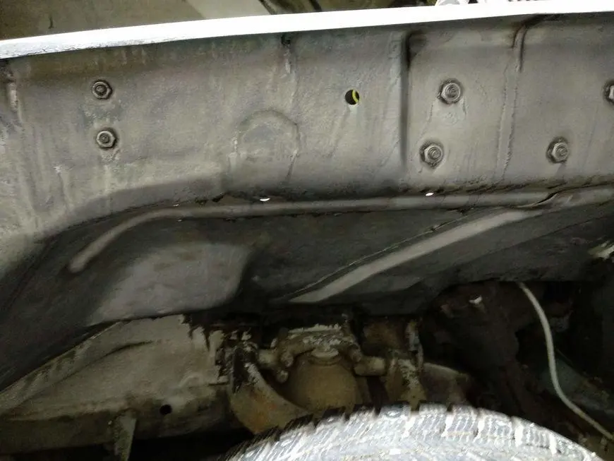 The middle part of the mudguard treated once with a rust converter and cleaned of acid